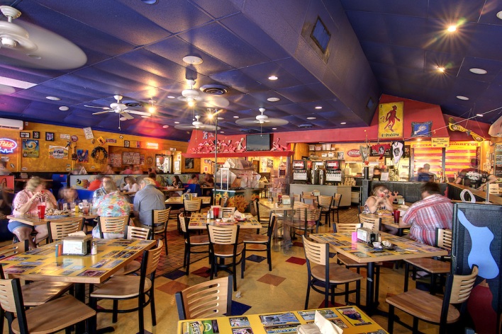 People dine at Flaming Amy's Burrito Barn in Wilmington, NC on Saturday, July 12, 2014. Copyright 2014 Jason Barnette Flaming Amy's Burrito Barn is locally owned by Amy and Jay Muxworthy, both of whom have a passion for great food, fun atmosphere, and good customer service. The Barn was the first venture for the couple, who also own and operate Flaming Amy's Bowl.